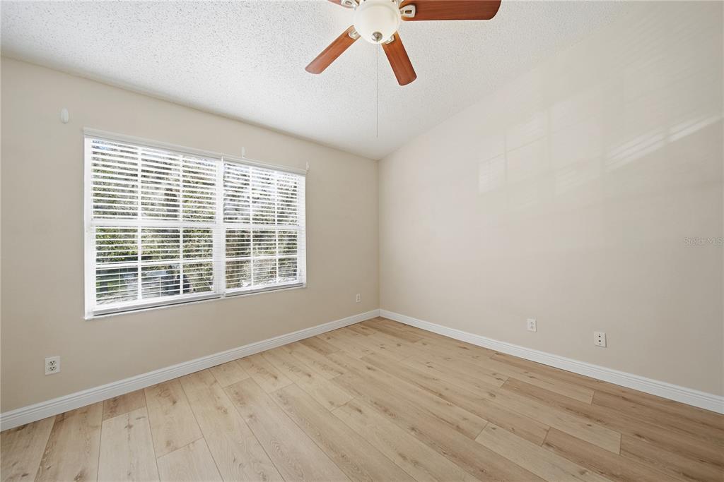 8530 Hunters Key Circle Tampa, FL 33647 - Photo 12 of 18 a view of an empty room with a window