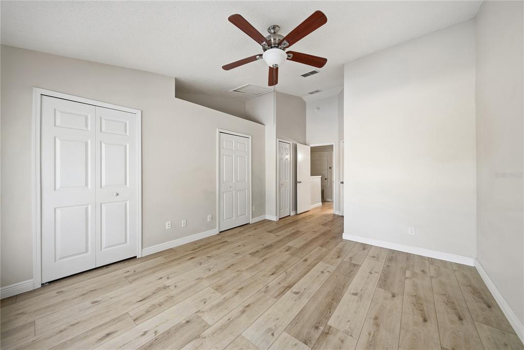 8530 Hunters Key Circle Tampa, FL 33647 - Photo 13 of 18 wooden floor in an empty room