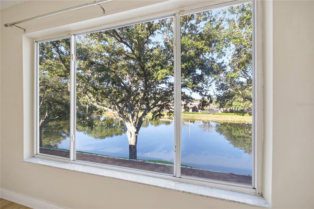 8530 Hunters Key Circle Tampa, FL 33647 - Photo 18 of 18 a view of a glass door and a window