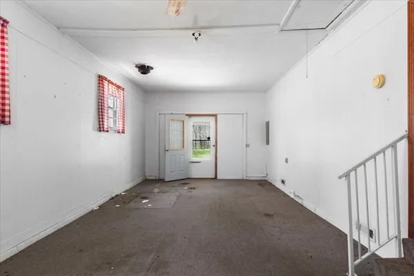 a house with wooden fence