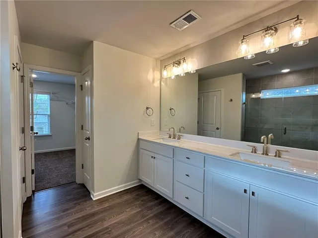 an empty room with closet area