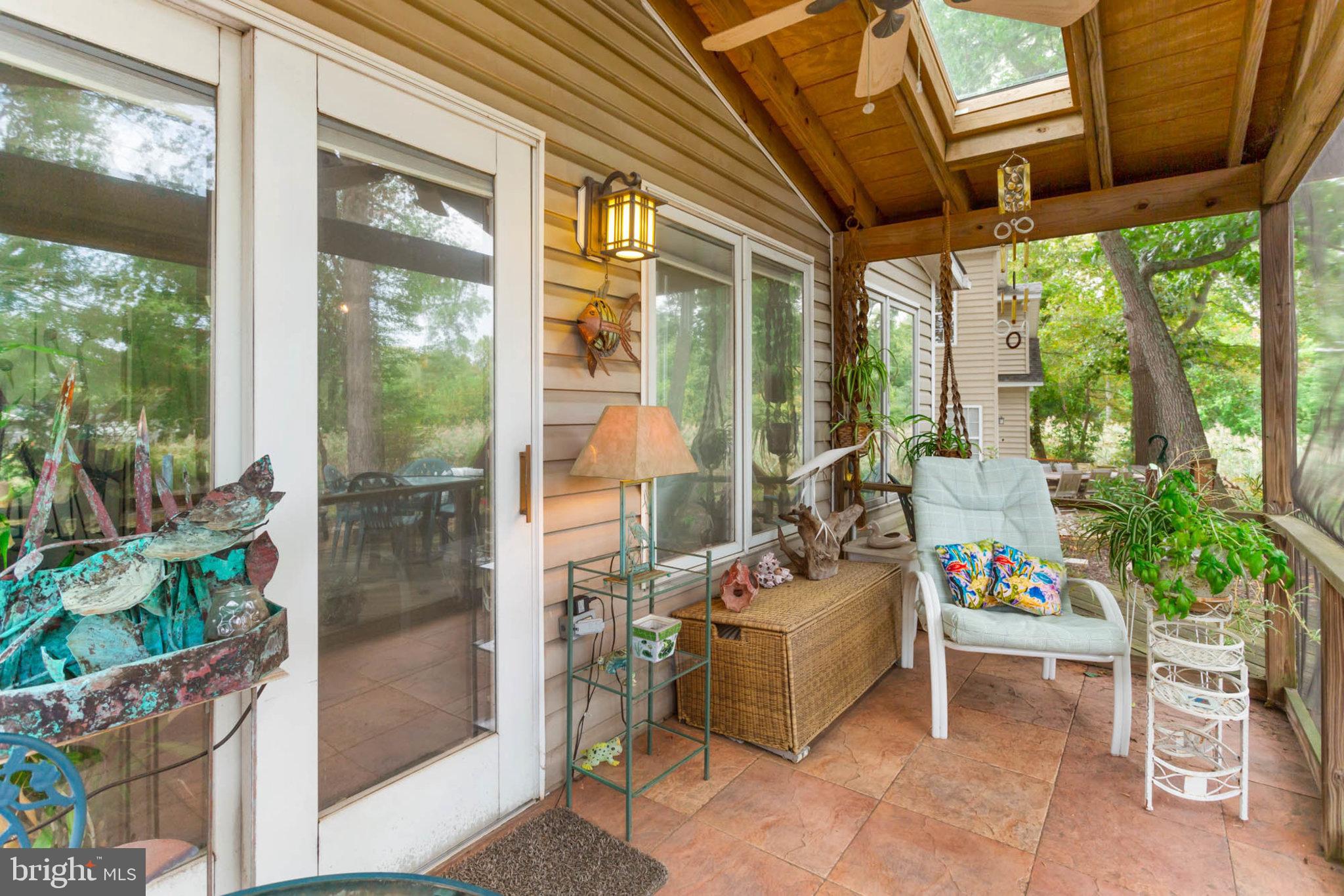 1024 Shore Acres Road Arnold, MD 21012 - Photo 40 of 63 Screened Porch with Vaulted Ceiling & Ceiling Fan