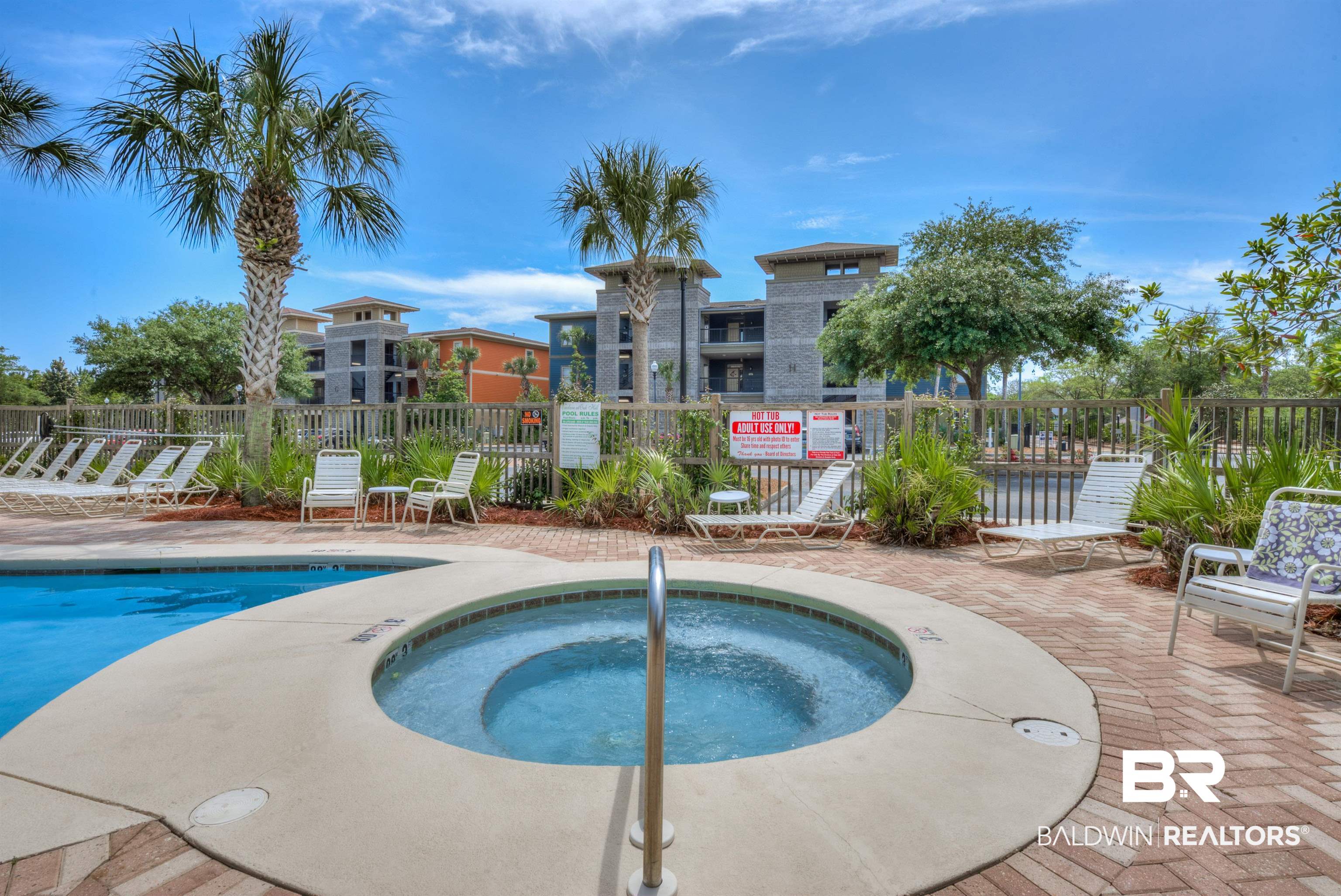 1430 Regency Road, Unit A301 Gulf Shores, AL 36542 - Photo 45 of 47 View of pool with a patio and a hot tub