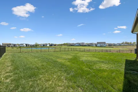 a view of a golf course with a lake