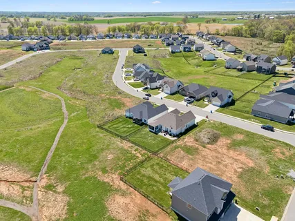 an aerial view of a house with a garden