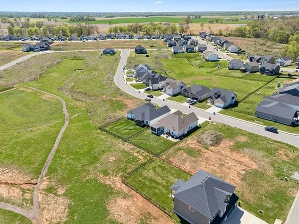 an aerial view of a house with a garden