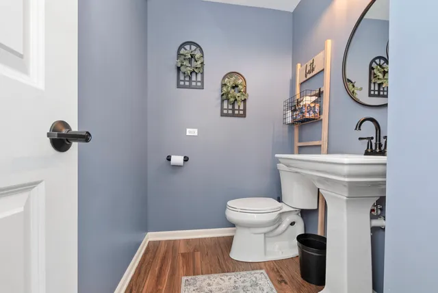 a bathroom with a toilet and a sink