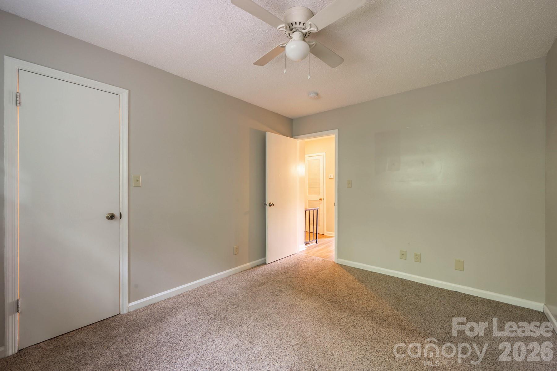 135 Ribet Avenue Southwest, Unit C12 Valdese, NC 28690 - Photo 15 of 19 a view of an empty room