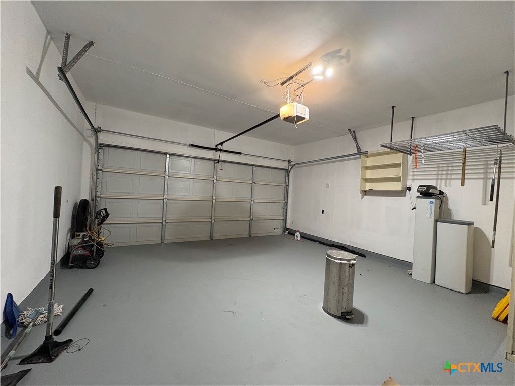 102 Wisteria Way San Marcos, TX 78666 - Photo 12 of 30 a view of a room with gym equipment