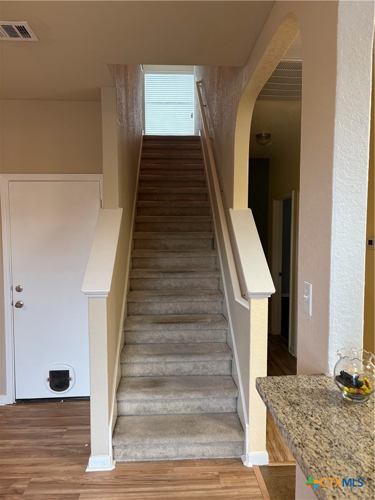 102 Wisteria Way San Marcos, TX 78666 - Photo 21 of 30 a view of entryway and hall with wooden floor