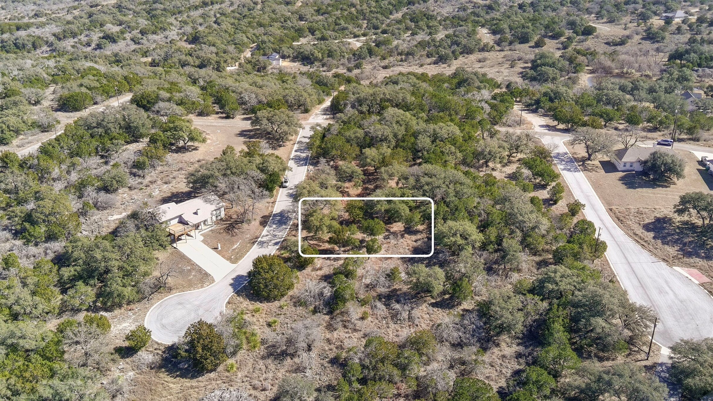 Lot K8051 Ridgeview Horseshoe Bay, TX 78657 - Photo 4 of 14 an aerial view of house with yard and mountain view in back