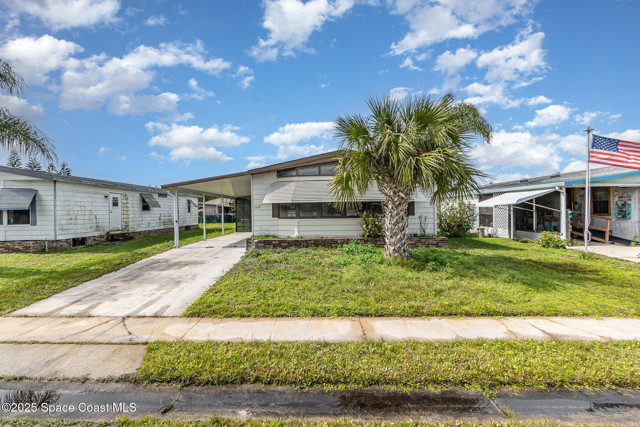 1918 Sago Palm Street Northeast Palm Bay, FL 32905 - Photo 2 of 26 002_dsc04945-edit