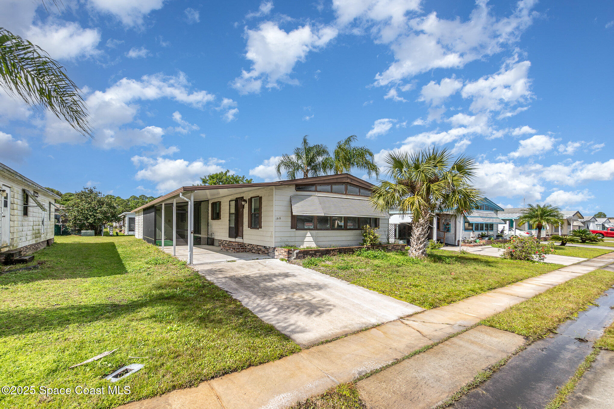 1918 Sago Palm Street Northeast Palm Bay, FL 32905 - Photo 3 of 26 003_dsc04929-edit