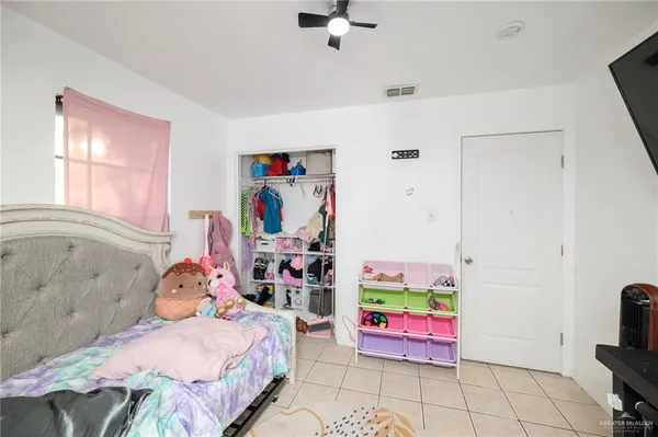 a bedroom with furniture and a bed