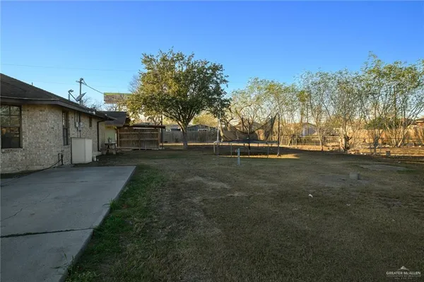 a view of backyard with green space