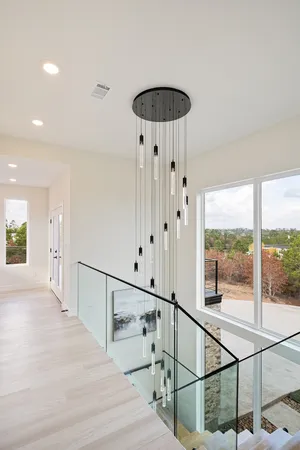 a view of entryway and hall with a dining table