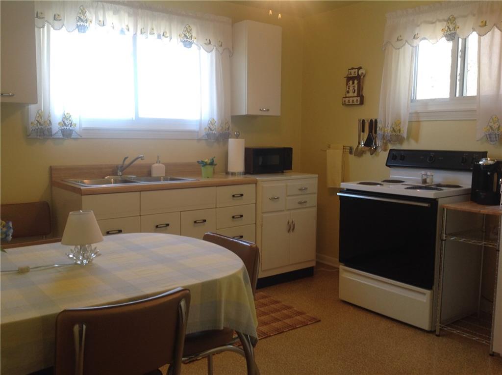 188 Bryson Road Bairdford, PA 15006 - Photo 17 of 22 a kitchen with a sink appliances and a window