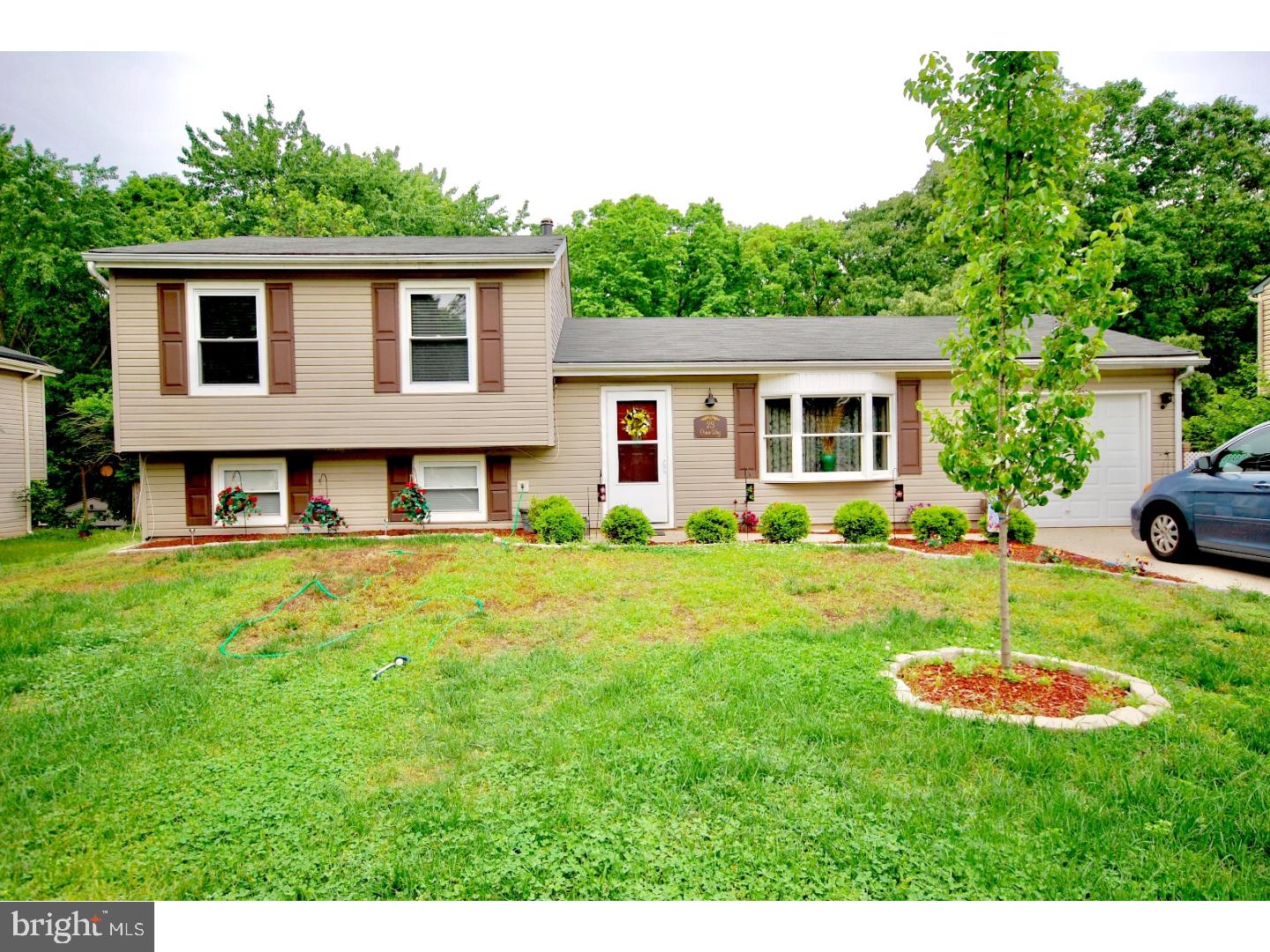 23 Orion Way Sewell, NJ 08080 - Photo 1 of 25 a view of a house with a yard and sitting area