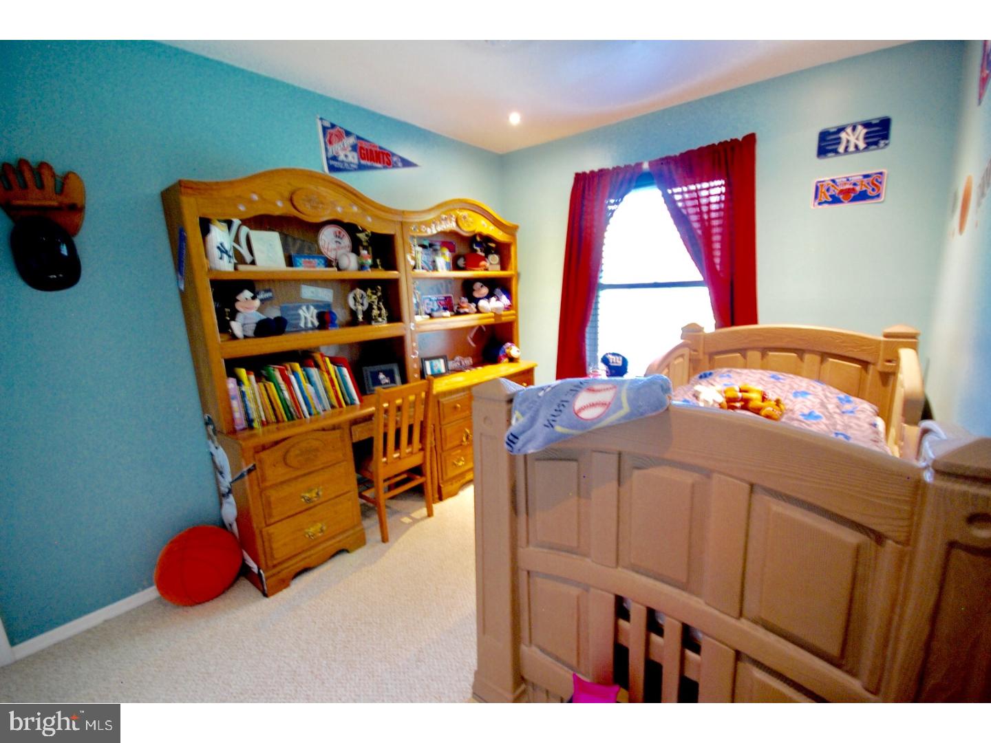 23 Orion Way Sewell, NJ 08080 - Photo 14 of 25 a bedroom with a bed and a book shelf