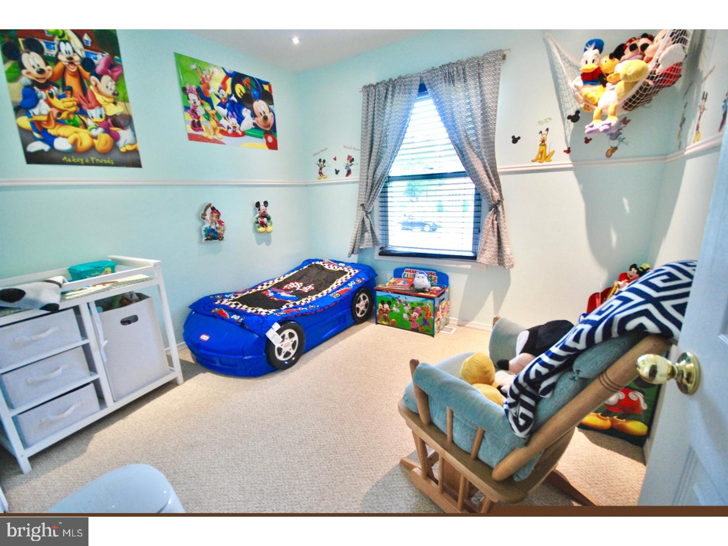 23 Orion Way Sewell, NJ 08080 - Photo 15 of 25 a bedroom with a bed and a painting on the wall