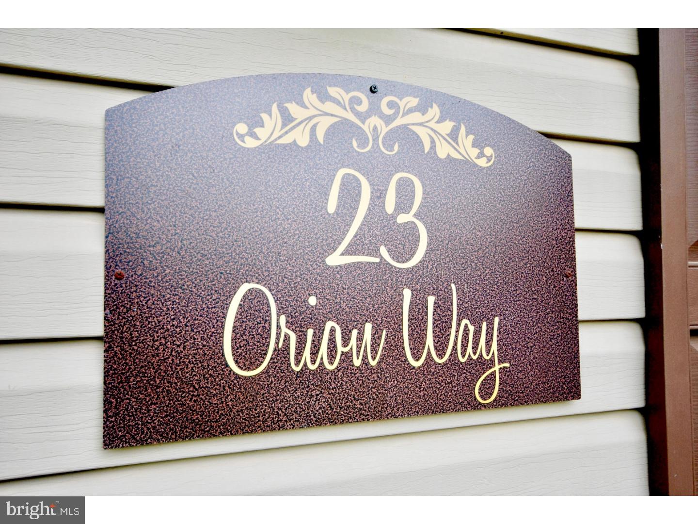 23 Orion Way Sewell, NJ 08080 - Photo 2 of 25 a sign that is on the wall of building