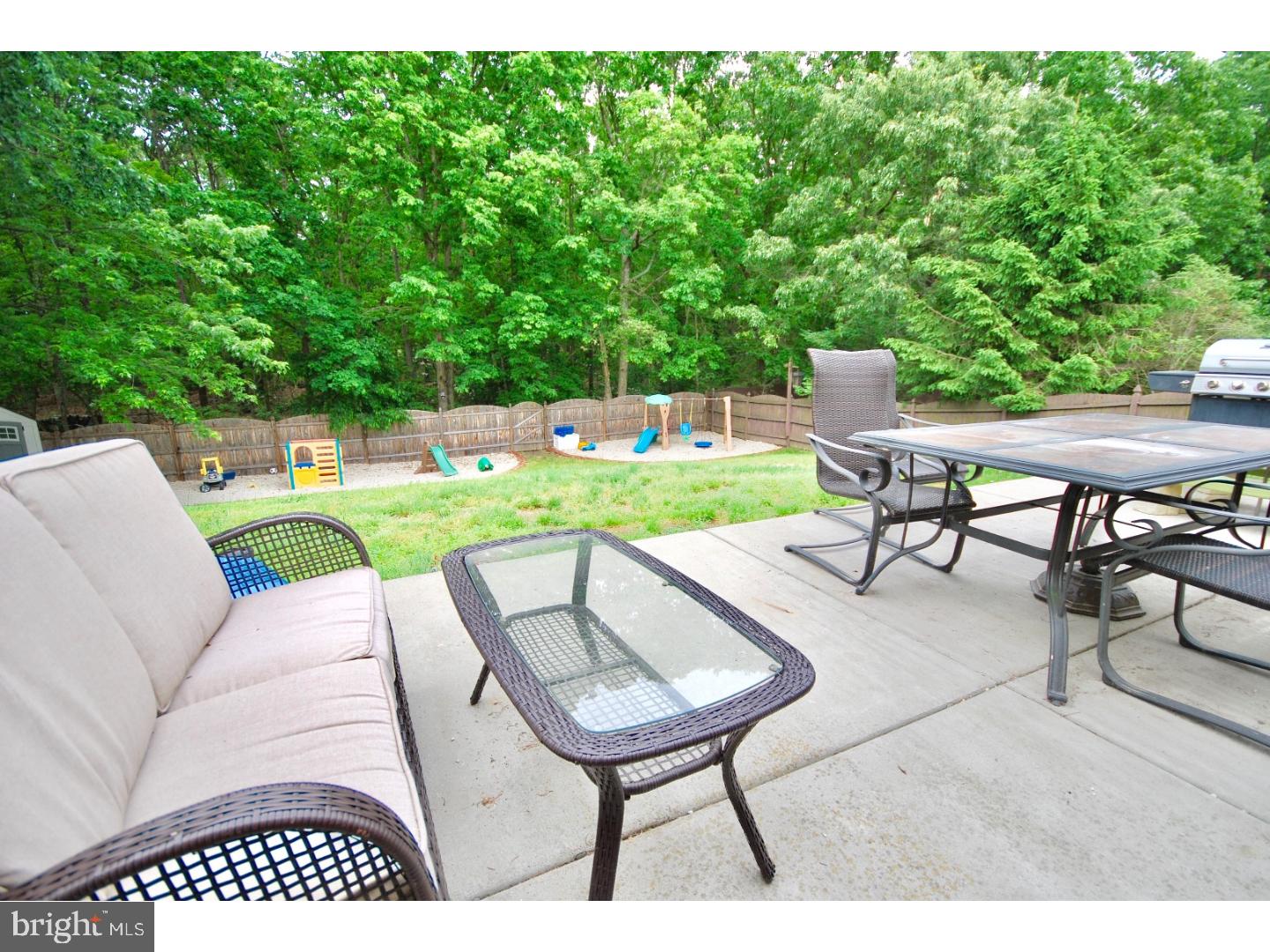 23 Orion Way Sewell, NJ 08080 - Photo 21 of 25 a view of a backyard with furniture