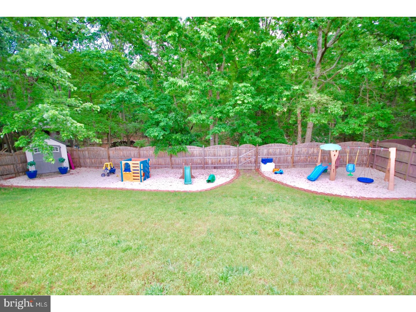 23 Orion Way Sewell, NJ 08080 - Photo 22 of 25 a backyard of a house with table and chairs