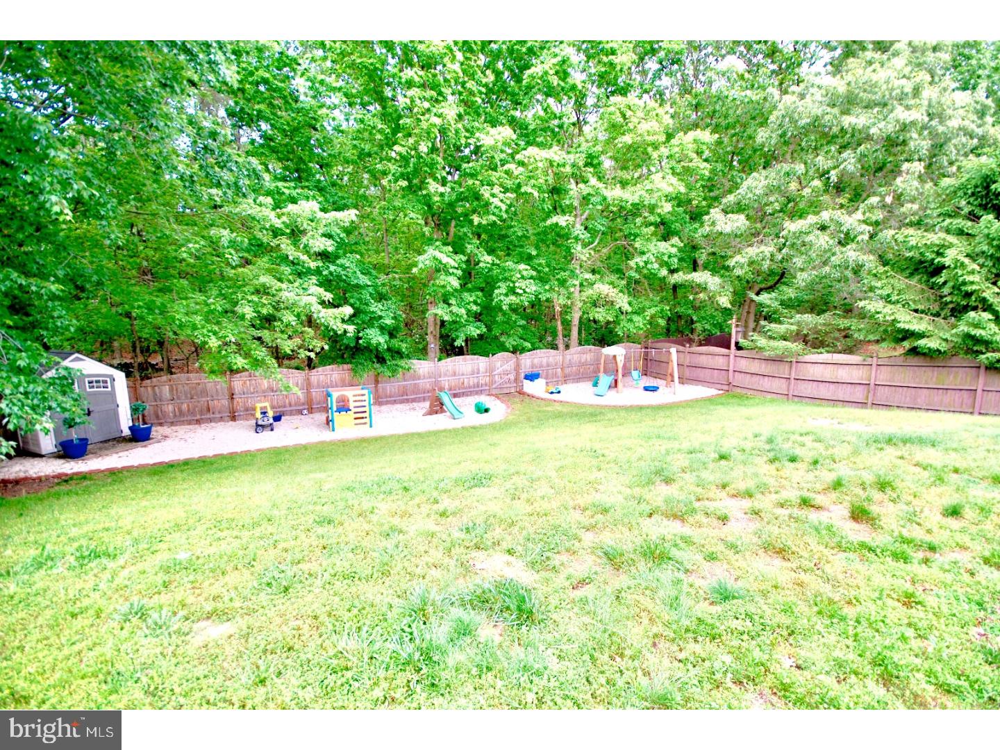 23 Orion Way Sewell, NJ 08080 - Photo 25 of 25 a small garden covered with tall trees