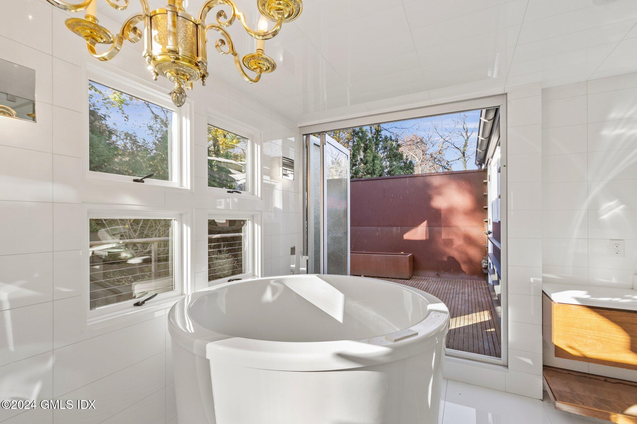 6 Marks Road Riverside, CT 06878 - Photo 12 of 19 a living room with furniture and a flat screen tv