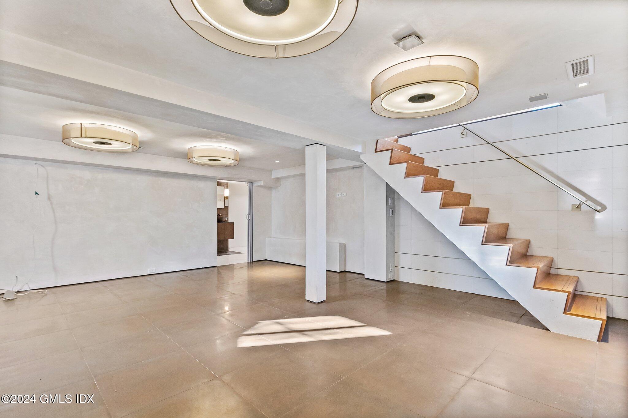 6 Marks Road Riverside, CT 06878 - Photo 13 of 19 a view of a livingroom with wooden floor