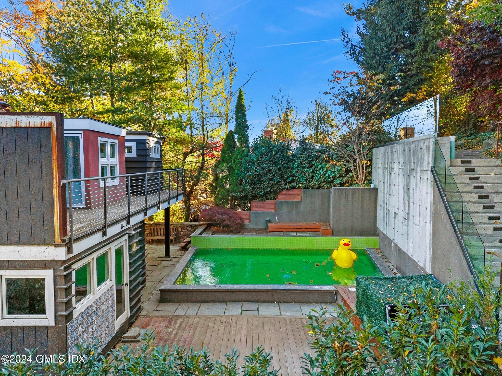 6 Marks Road Riverside, CT 06878 - Photo 15 of 19 a view of a back yard with a trampoline