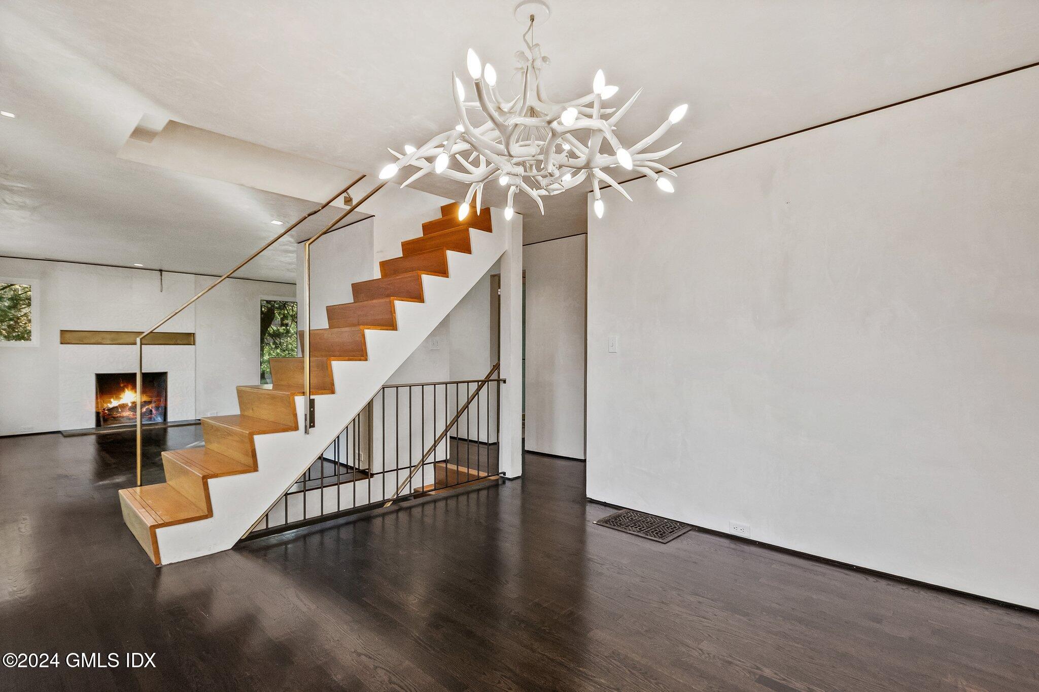 6 Marks Road Riverside, CT 06878 - Photo 3 of 19 a view of entryway and hall with wooden floor