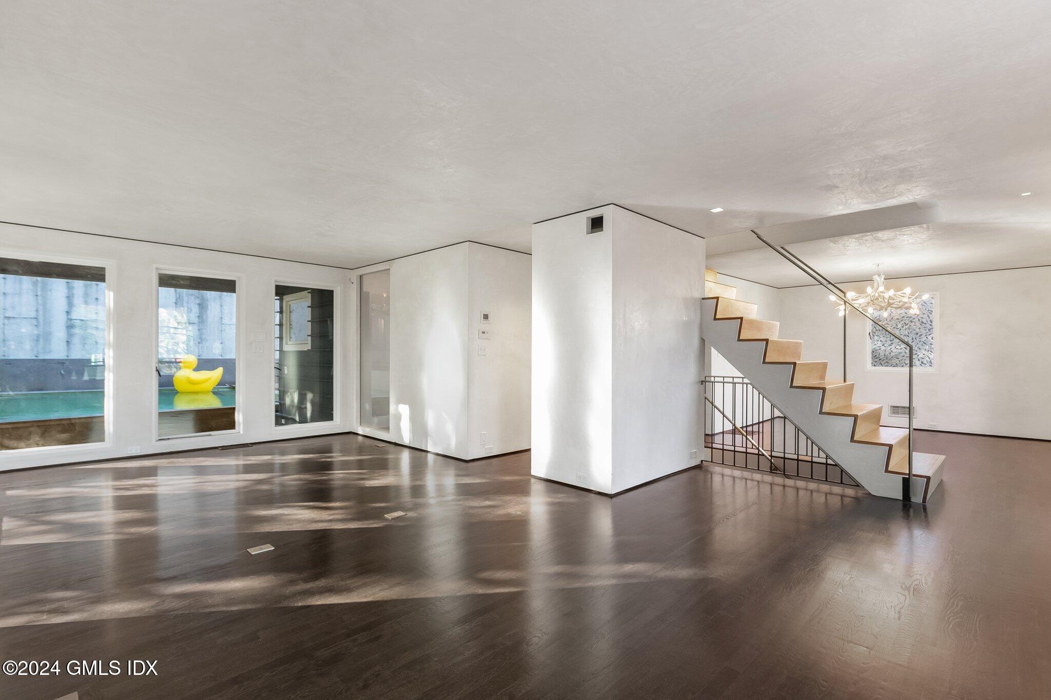 6 Marks Road Riverside, CT 06878 - Photo 4 of 19 a view of an entryway with wooden floor