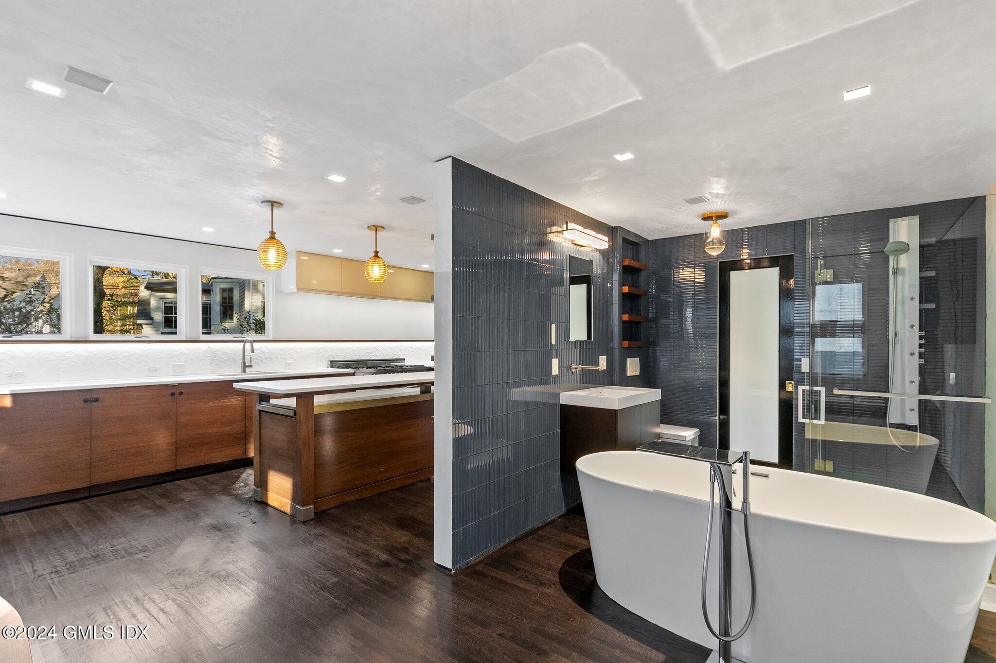 6 Marks Road Riverside, CT 06878 - Photo 8 of 19 a kitchen with stainless steel appliances granite countertop a refrigerator a stove and a sink