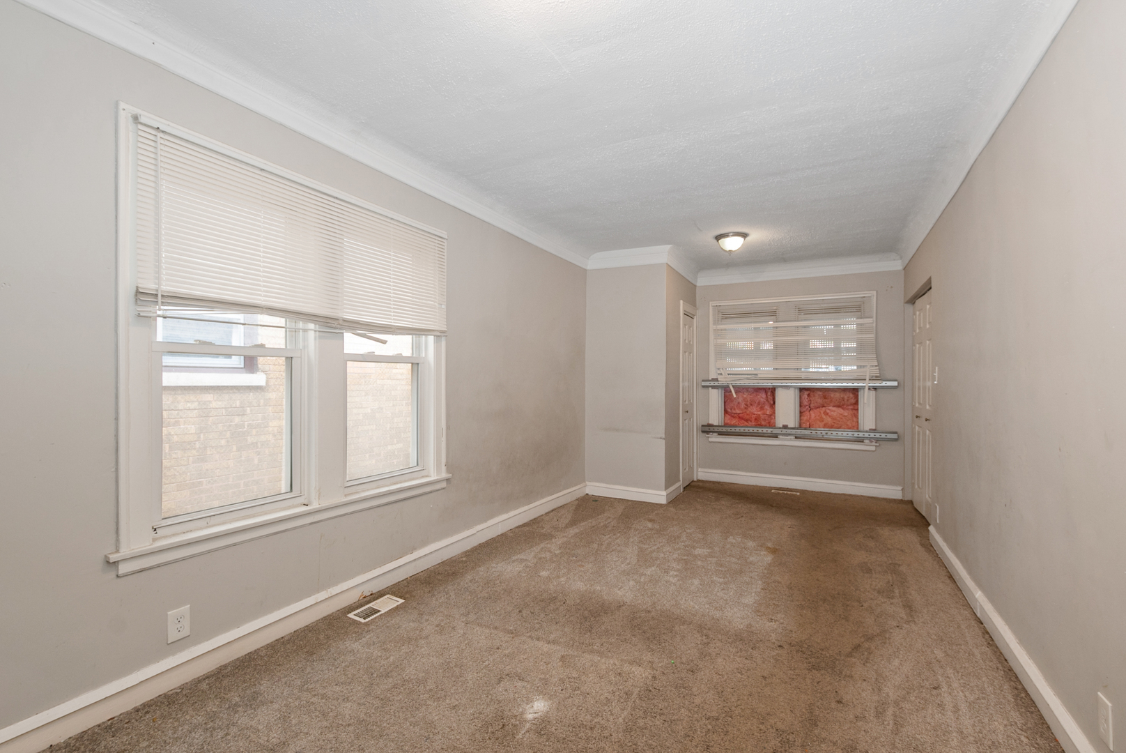1040 West 92nd Place Chicago, IL 60620 - Photo 6 of 19 an empty room with windows