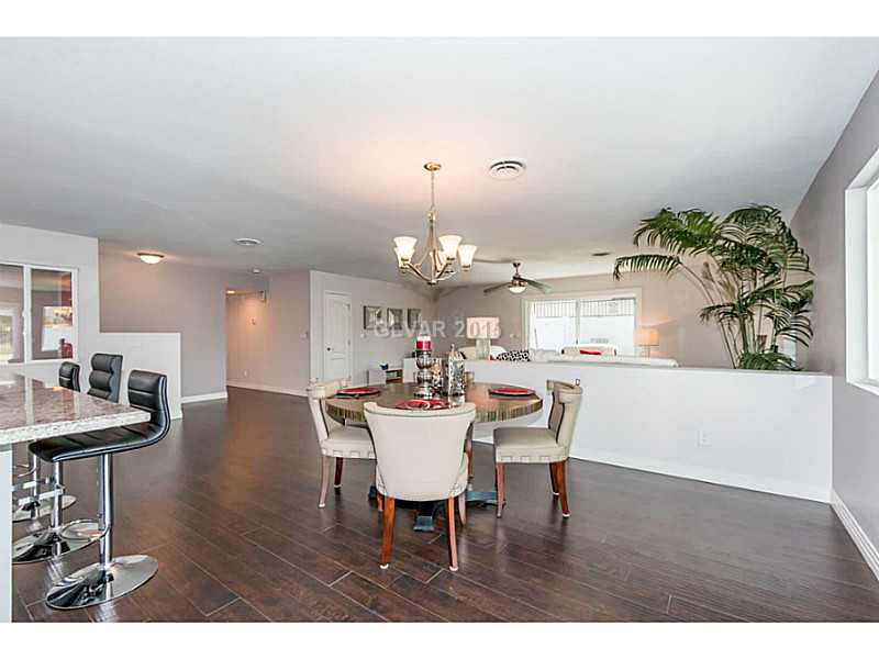 633 East Fairway Road Henderson, NV 89015 - Photo 12 of 35 Property Photo. View of dining area and living room from kitchen.
