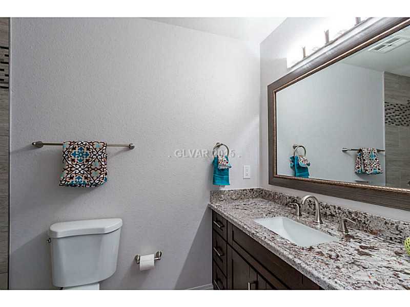 633 East Fairway Road Henderson, NV 89015 - Photo 19 of 35 Property Photo. Hallway bathroom servicing 2nd & 3rd bedrooms.