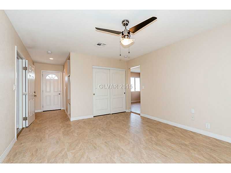 633 East Fairway Road Henderson, NV 89015 - Photo 23 of 35 Property Photo. Guest house looking towards living room and bathroom. Also shows door access to backyard and pool.