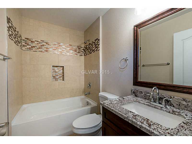 633 East Fairway Road Henderson, NV 89015 - Photo 28 of 35 Property Photo. Guest house bathroom with over sized tub.