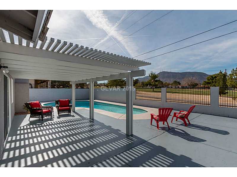 633 East Fairway Road Henderson, NV 89015 - Photo 3 of 35 Property Photo. View of patio cover from outside 1/2 bathroom looking out towards golf course.