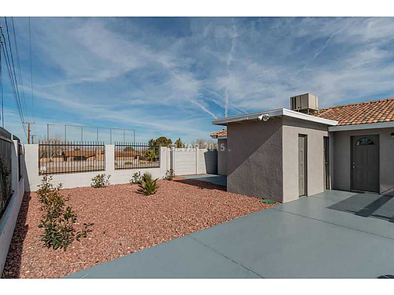 633 East Fairway Road Henderson, NV 89015 - Photo 33 of 35 Property Photo. Desert landscaping off of patio looking towards guest house.