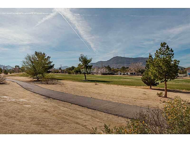 633 East Fairway Road Henderson, NV 89015 - Photo 34 of 35 Property Photo. View from backyard looking out to golf course and mountains in the distance.