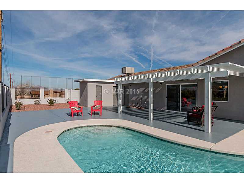 633 East Fairway Road Henderson, NV 89015 - Photo 4 of 35 Property Photo. Backyard and pool showing new patio cover.