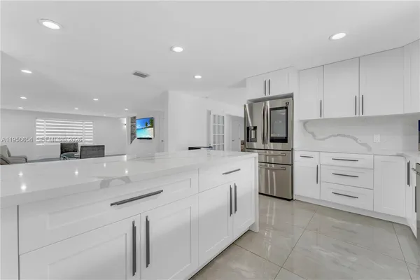 a white bath tub sitting in a bathroom