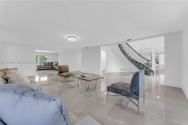 a spacious bathroom with a double vanity sink and a mirror