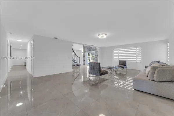 a bathroom with a double vanity sink and mirror