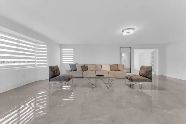 a bathroom with a tub and shower