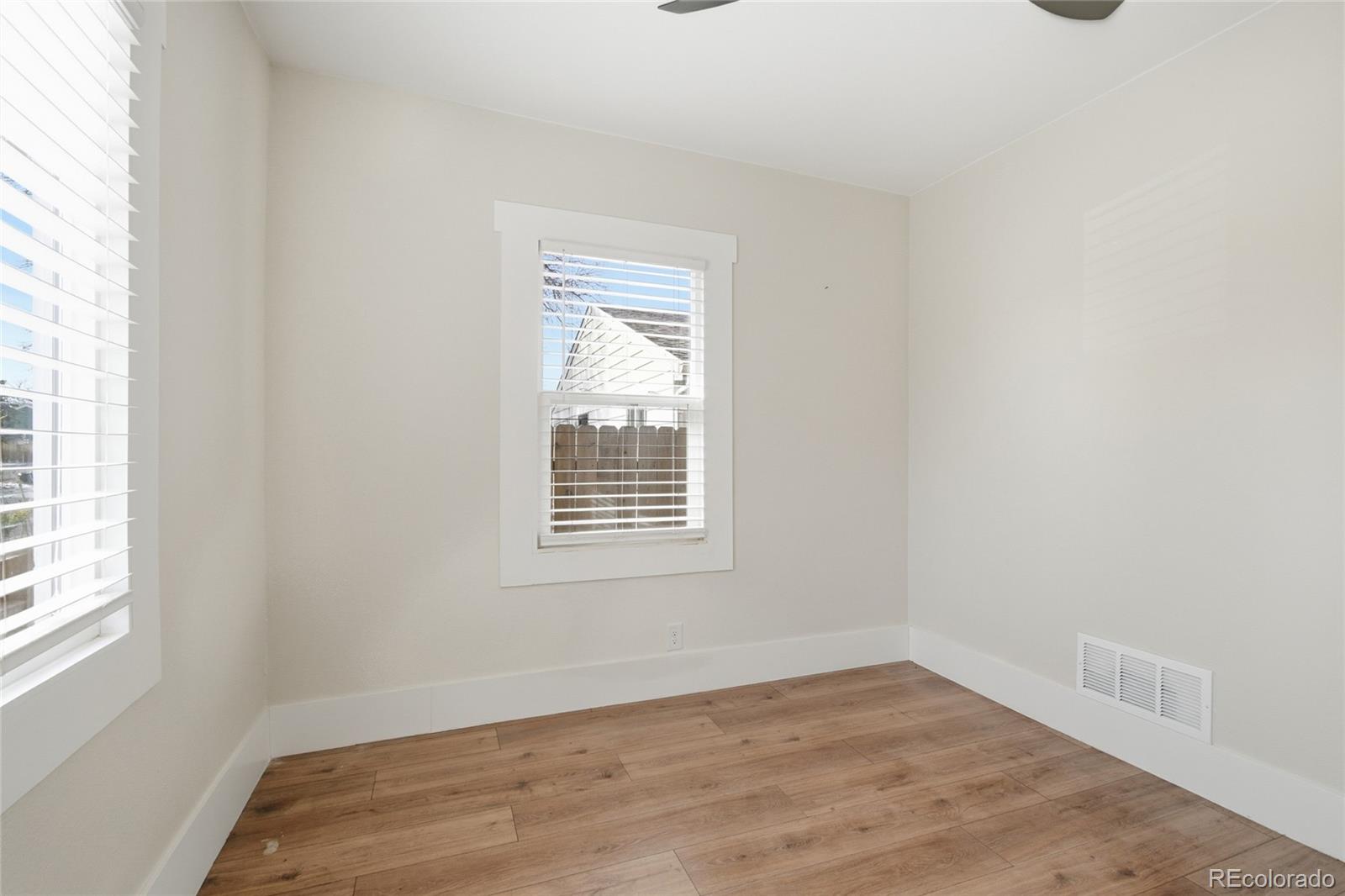 3417 West Alaska Place Denver, CO 80219 - Photo 18 of 30 an empty room with a window