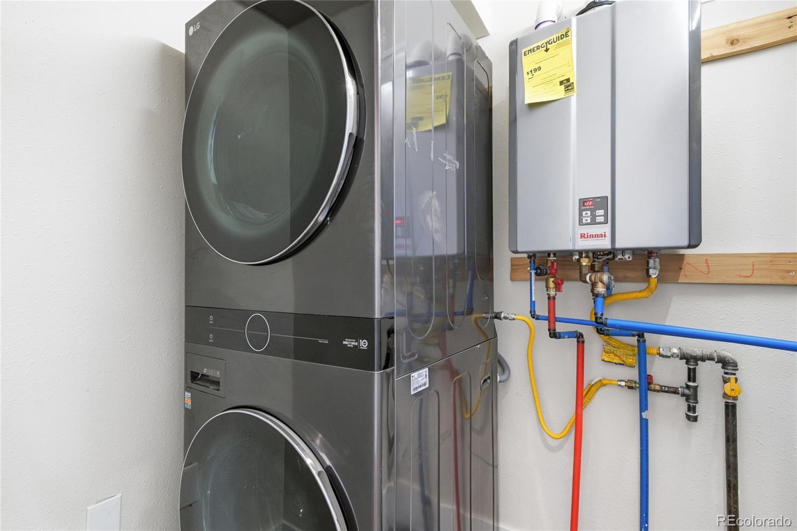 3417 West Alaska Place Denver, CO 80219 - Photo 27 of 30 a utility room with dryer and washer