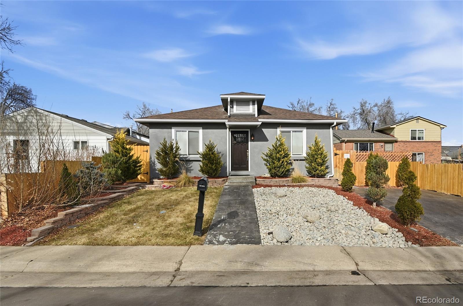 3417 West Alaska Place Denver, CO 80219 - Photo 6 of 30 front view of a house with a porch